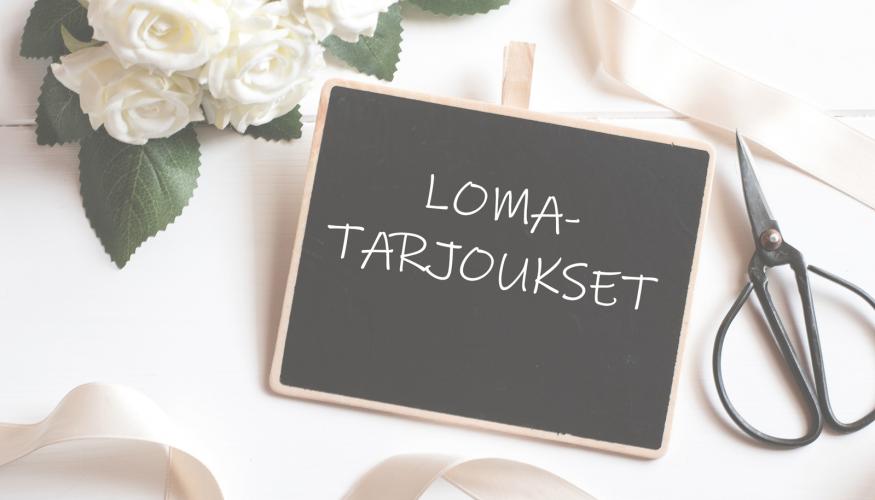 liitutaulu, jossa lukee "lomatarjoukset"